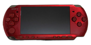 Metallic red PSP front with matching red buttons — representative product photograph